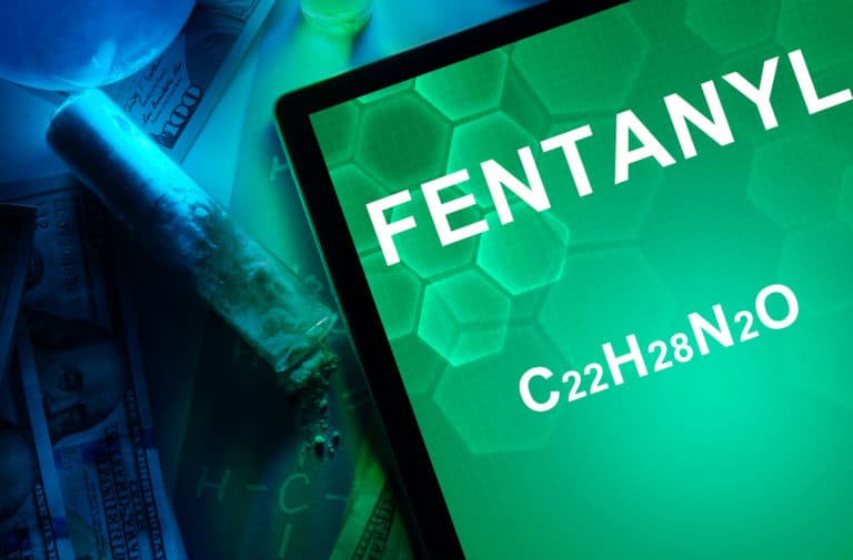 Tablet showing the chemical formula of the opioid Fentanyl.